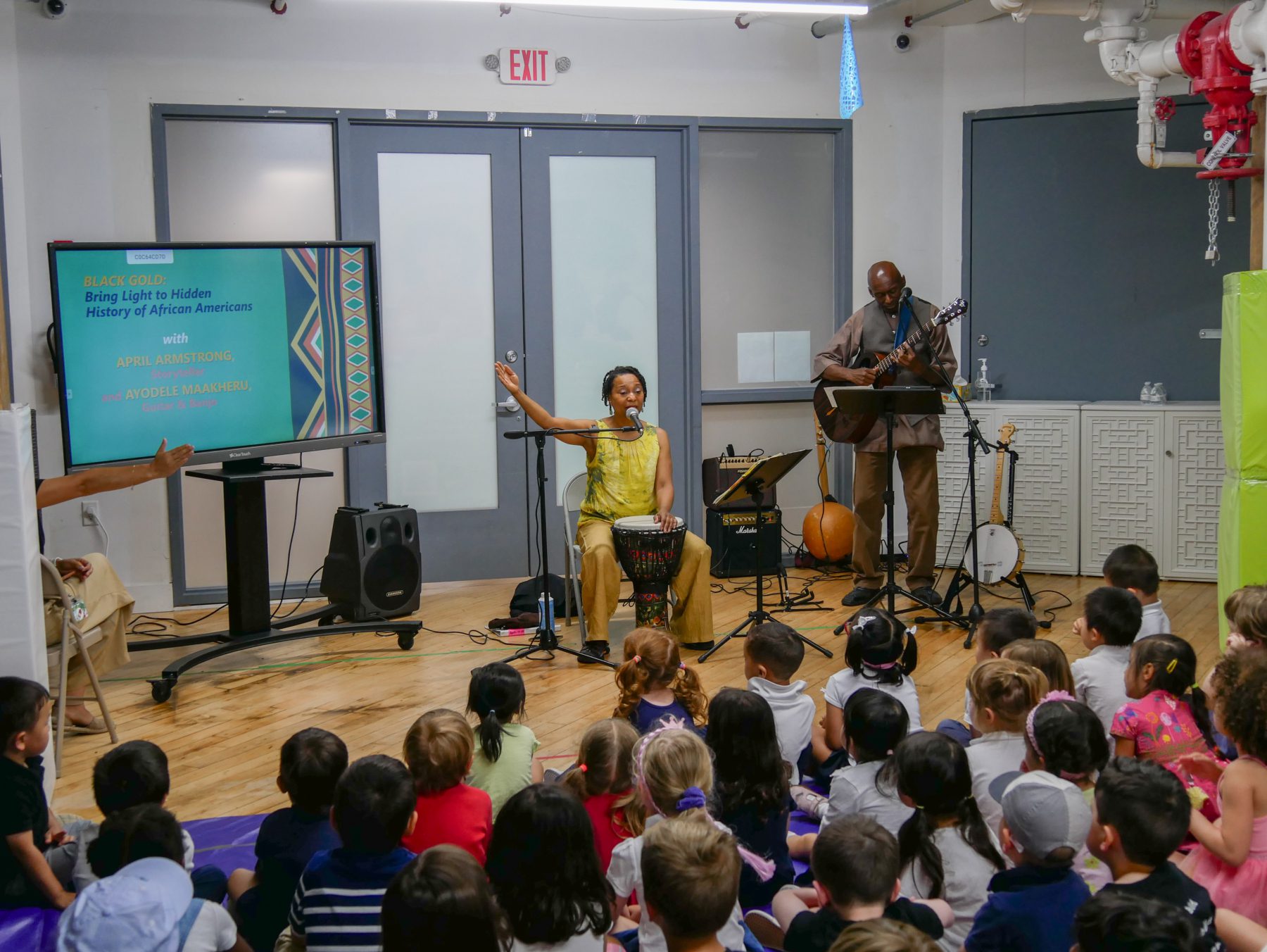 storyteller April Armstrong and musician Ayodele Maakheru engaged our students in African American history and music. 