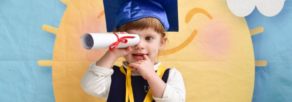 A preschool student at a French immersion school at a graduation presentation