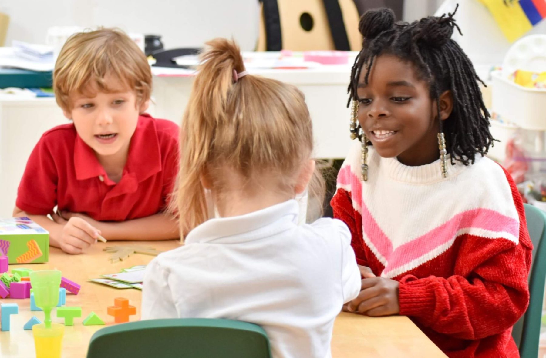 Students at a French immersion school working together at a table
