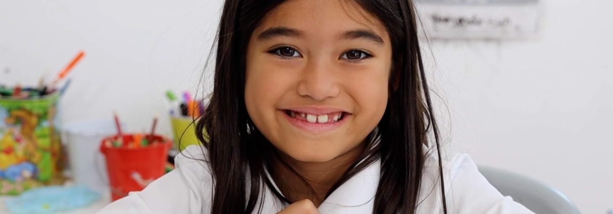 A student attending one of the top Hoboken private schools sitting in a classroom