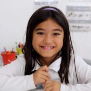 A student attending one of the top Hoboken private schools sitting in a classroom