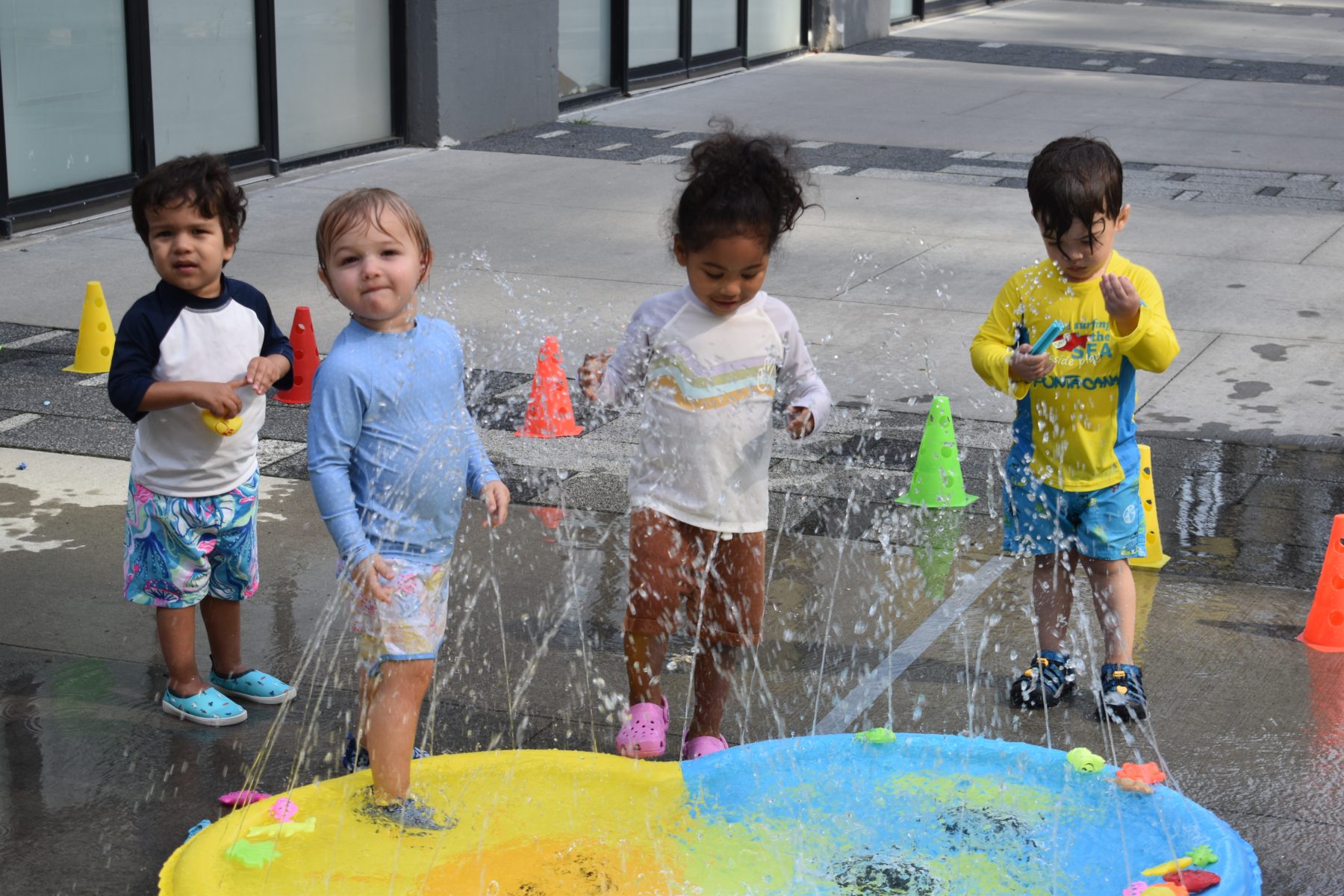 Toddlers engage on Water Day at Tessa International School's Summer Camp. 